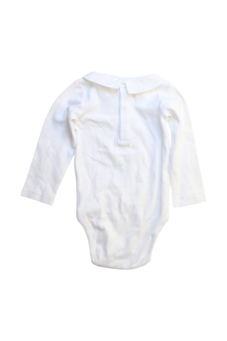 A White Long Sleeve Bodysuits from Jacadi in size 6-12M for girl. (Back View)