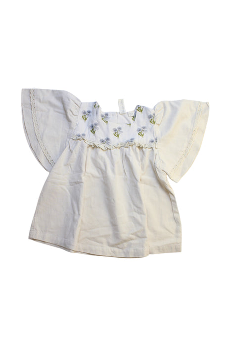 A White Short Sleeve Dresses from Little Cotton Clothes in size 5T for girl. (Front View)