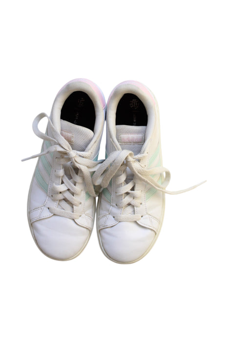 A White Sneakers from Adidas in size 10Y for girl. (Back View)