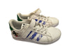 A White Sneakers from Adidas in size 7Y for boy. (Back View)