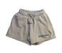 A Beige Shorts from Fear of God Essentials in size 6T for boy. (Front View)