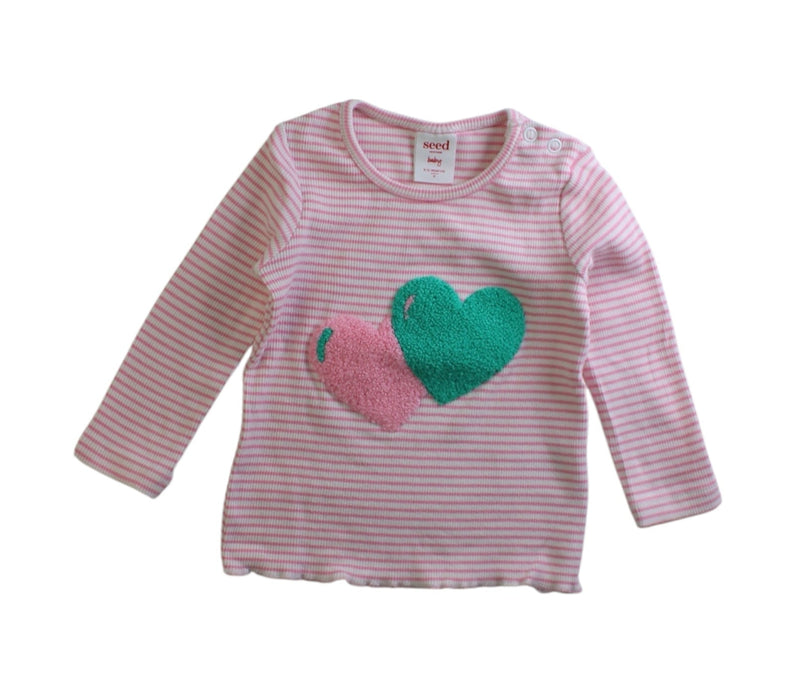 A Pink Long Sleeve Tops from Seed in size 6-12M for girl. (Front View)