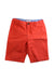 A Red Shorts from Jacadi in size 5T for boy. (Front View)