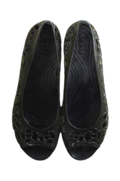 A Black Slip Ons from Crocs in size 10Y for girl. (Back View)