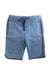 A Blue Shorts from Molo in size 5T for boy. (Front View)