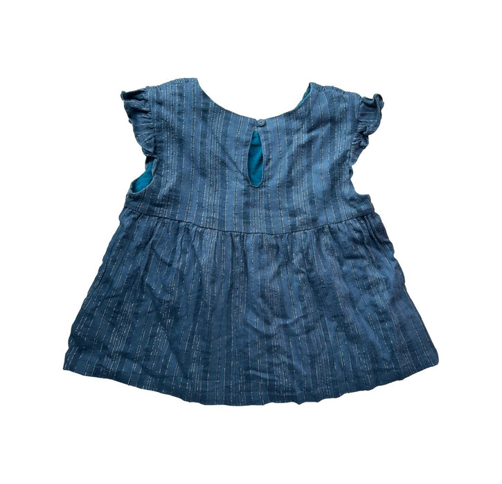A Blue Sleeveless Tops from Albetta in size 6T for girl. (Back View)