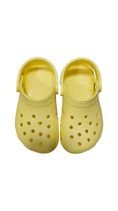 A Yellow Slip Ons from Crocs in size 3T for neutral. (Front View)