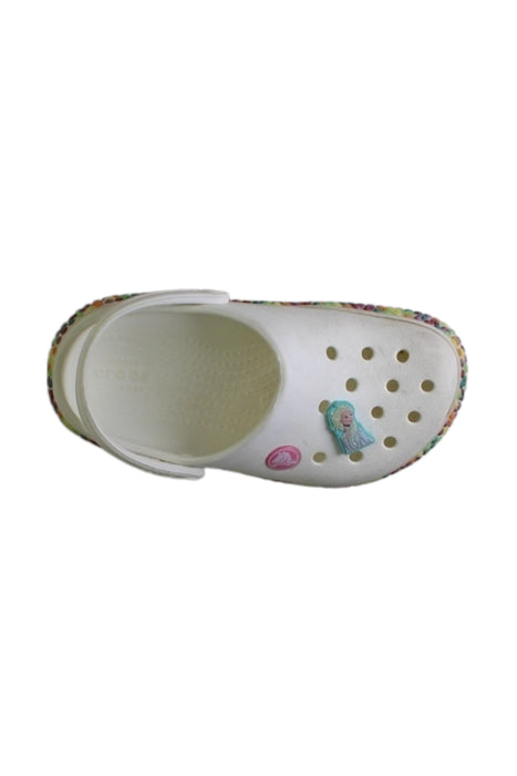 A White Slip Ons from Crocs in size 5T for girl. (Front View)