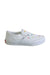 A White Slip Ons from Vans in size 5T for girl. (Front View)