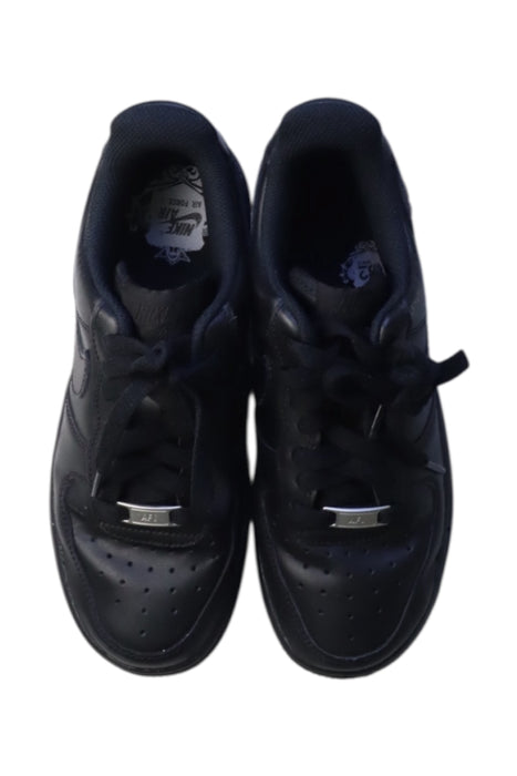 A Black Sneakers from Nike in size 11Y for boy. (Back View)