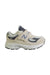 A Beige Sneakers from New Balance in size 4T for boy. (Front View)