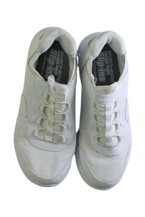 A White Sneakers from Skechers in size 12Y for neutral. (Back View)