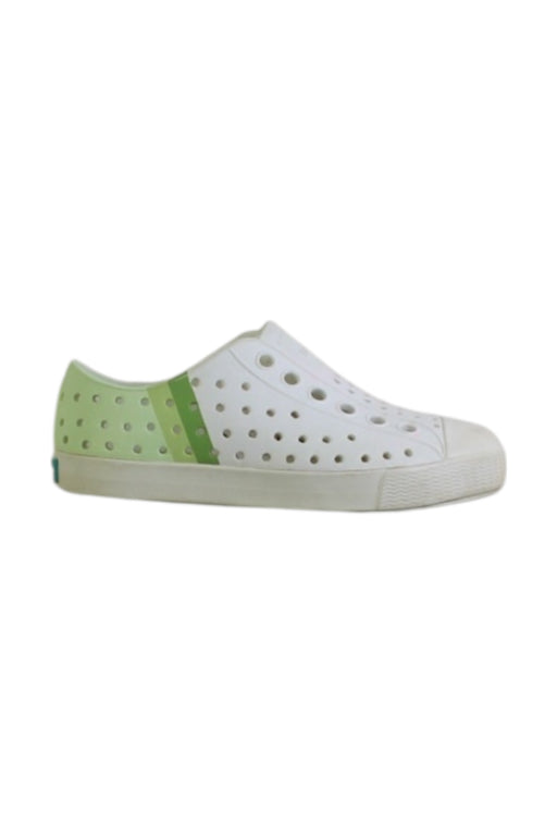 A White Slip Ons from Native Shoes in size 18-24M for neutral. (Front View)