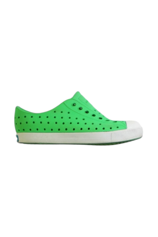 A Green Slip Ons from Native Shoes in size 5T for neutral. (Front View)