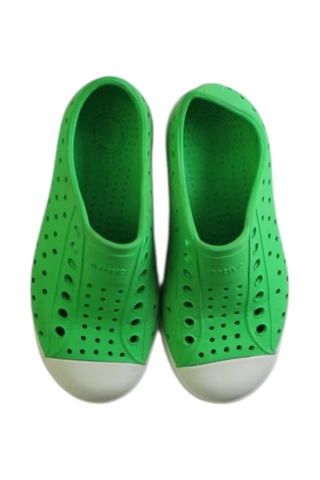 A Green Slip Ons from Native Shoes in size 5T for neutral. (Back View)