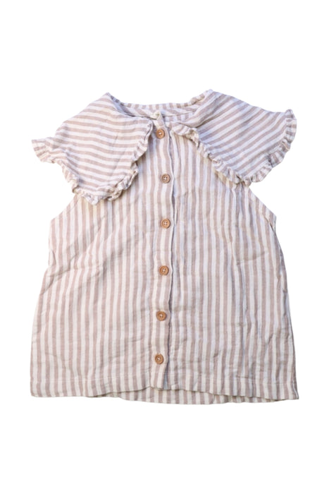 A Beige Sleeveless Shirts from garbo&friends in size 5T for girl. (Front View)