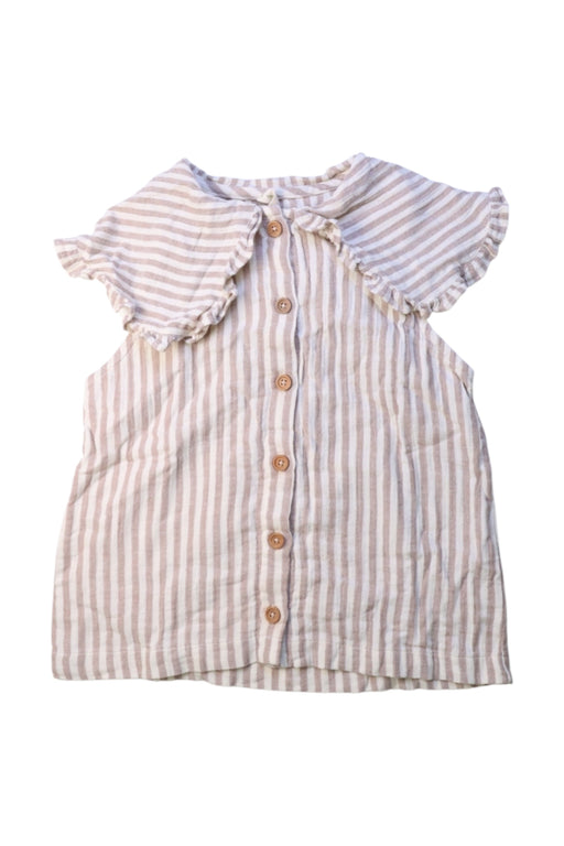 A Beige Sleeveless Shirts from garbo&friends in size 5T for girl. (Front View)