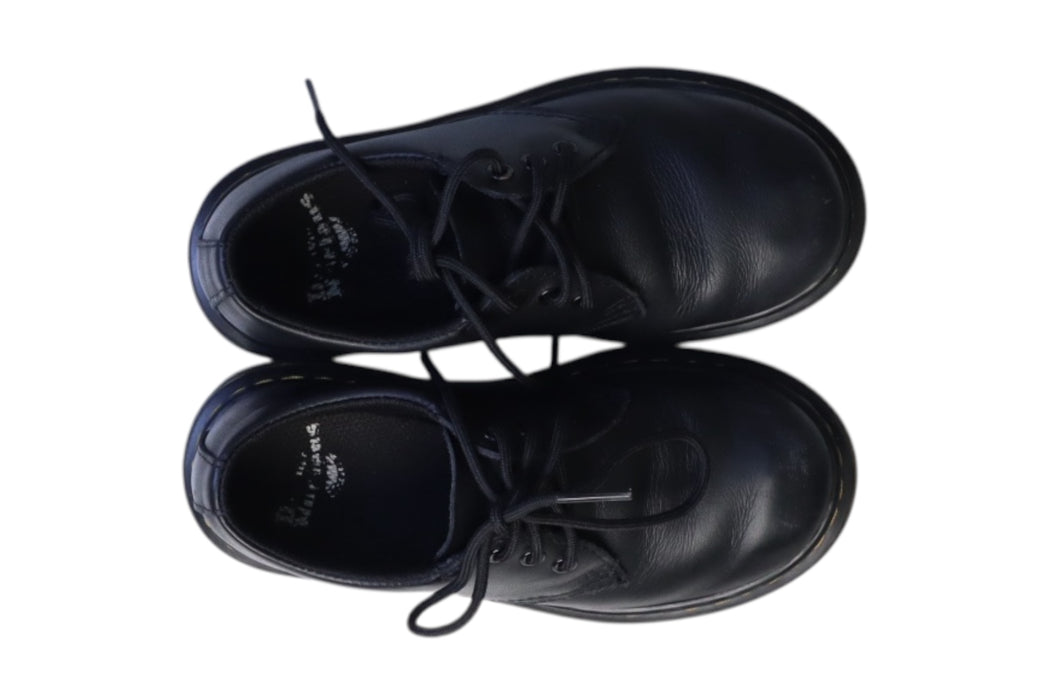 A Blue Dress Shoes from Dr. Martens in size Newborn for neutral. (Back View)