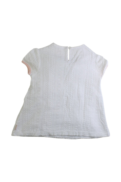 A White Short Sleeve Dresses from BCBG in size 2T for girl. (Back View)