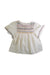 A White Sleeveless Tops from Bonpoint in size 4T for girl. (Front View)