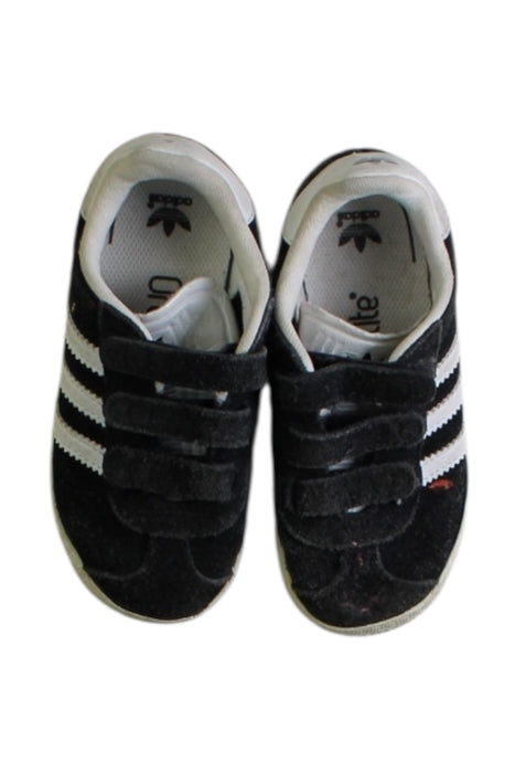 A Black Sneakers from Adidas in size 4T for girl. (Back View)