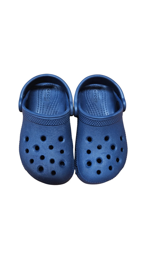 A Blue Slip Ons from Crocs in size 3T for neutral. (Front View)