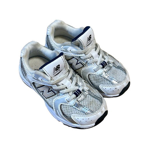 A White Sneakers from New Balance in size 3T for neutral. (Front View)