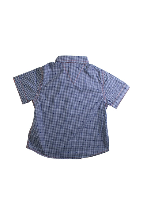 A Blue Short Sleeve Polos from As Little As in size 12-18M for boy. (Back View)