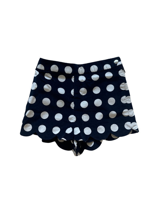 A Navy Shorts from Jacadi in size 4T for girl. (Front View)
