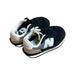 A Black Sneakers from New Balance in size 4T for neutral. (Back View)