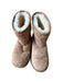 A Beige Winter Boots from UGG in size 7Y for neutral. (Front View)