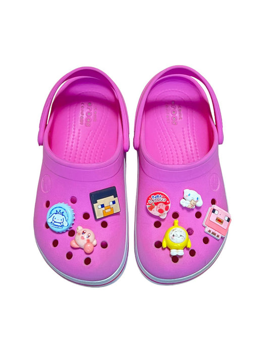 A Pink Slip Ons from Crocs in size 6T for girl. (Front View)
