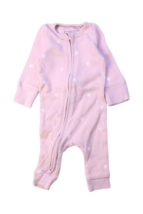 A Pink Onesies from Country Road in size Newborn for girl. (Front View)