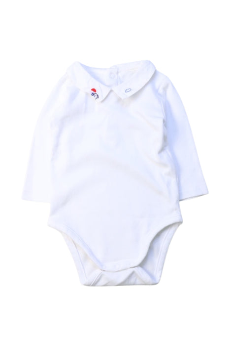 A White Long Sleeve Bodysuits from Jacadi in size 0-3M for girl. (Front View)