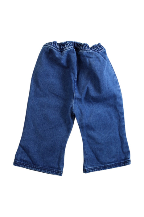 A Blue Jeans from Louis Louise in size 6-12M for girl. (Back View)