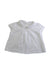 A White Sleeveless Tops from Nanos in size 3-6M for girl. (Front View)