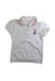 A White Short Sleeve Polos from Nicholas & Bears in size 6T for girl. (Front View)