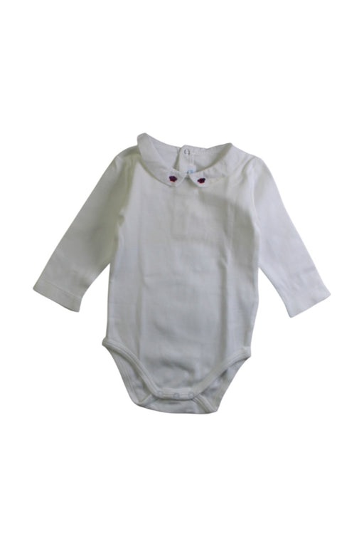 A White Long Sleeve Bodysuits from Jacadi in size 3-6M for girl. (Front View)