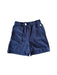 A Blue Shorts from Petit Bateau in size 4T for neutral. (Front View)