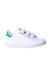 A White Sneakers from Adidas in size 4T for boy. (Front View)