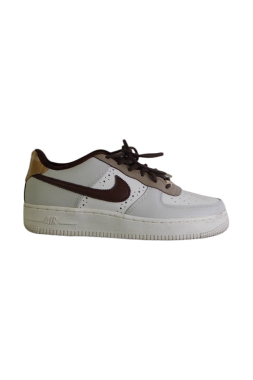 A White Sneakers from Nike in size 12Y for girl. (Front View)