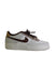 A White Sneakers from Nike in size 12Y for girl. (Front View)