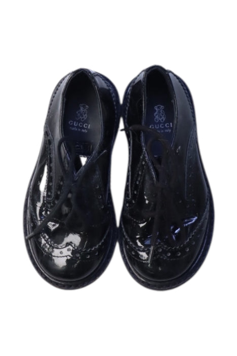 A Black Flats from Gucci in size 18-24M for girl. (Back View)