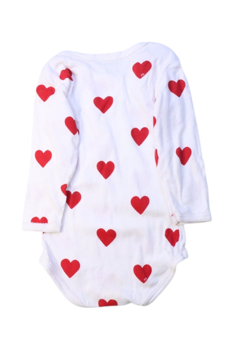 A White Long Sleeve Bodysuits from Petit Bateau in size 6-12M for girl. (Back View)