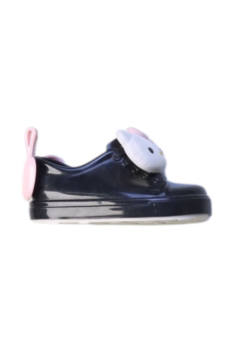 A Black Slip Ons from Mini Melissa in size 12-18M for girl. (Front View)