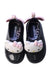 A Black Slip Ons from Mini Melissa in size 12-18M for girl. (Back View)