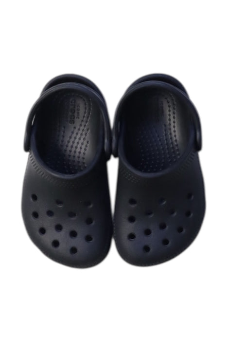 A Navy Slip Ons from Crocs in size 18-24M for neutral. (Back View)