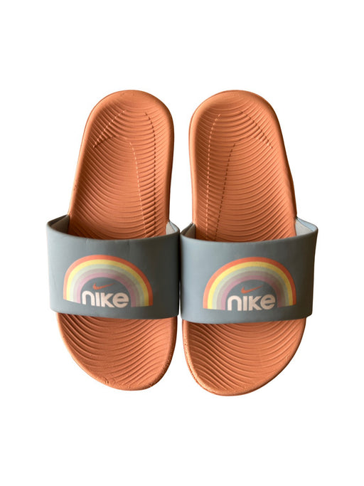 A Peach Slip Ons from Nike in size 10Y for neutral. (Front View)