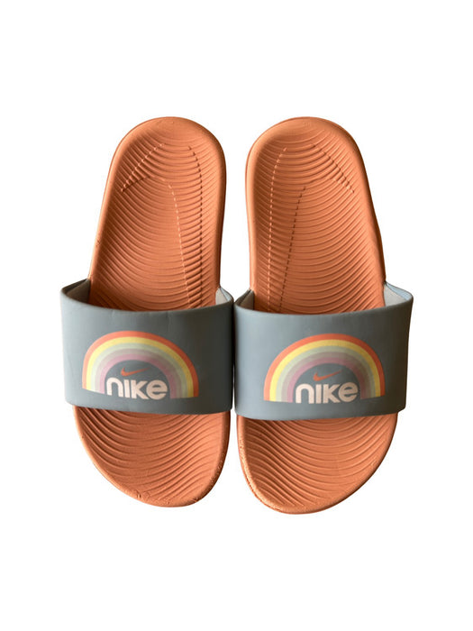 A Peach Slip Ons from Nike in size 10Y for neutral. (Front View)