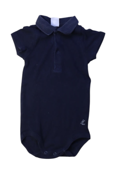 A Navy Short Sleeve Bodysuits from Petit Bateau in size 6-12M for boy. (Front View)